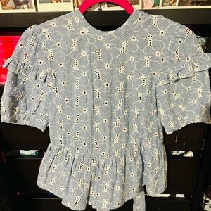 Linen like open back ruffle shirt blue with white floral patterned